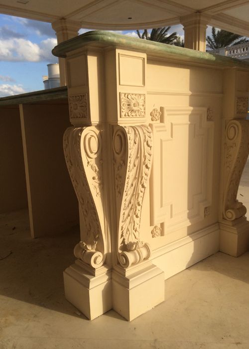 Ornate cast stone carved pedestal with acanthus leaf and scroll bracket detail